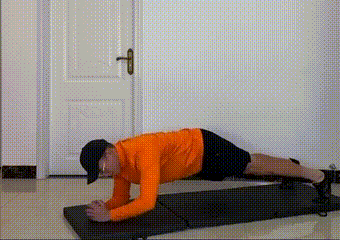 Person in plank opening one arm - core and back stability workout
