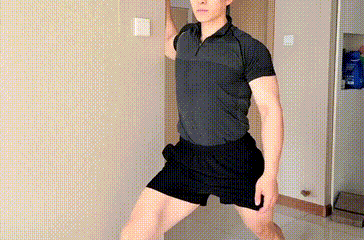 Man doing wall chest stretch - post workout chest cooldown