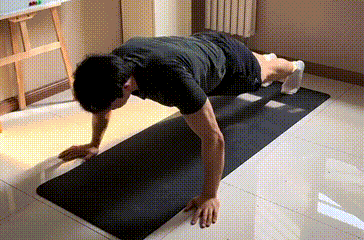 Man doing wide grip push-up - outer chest workout without equipment