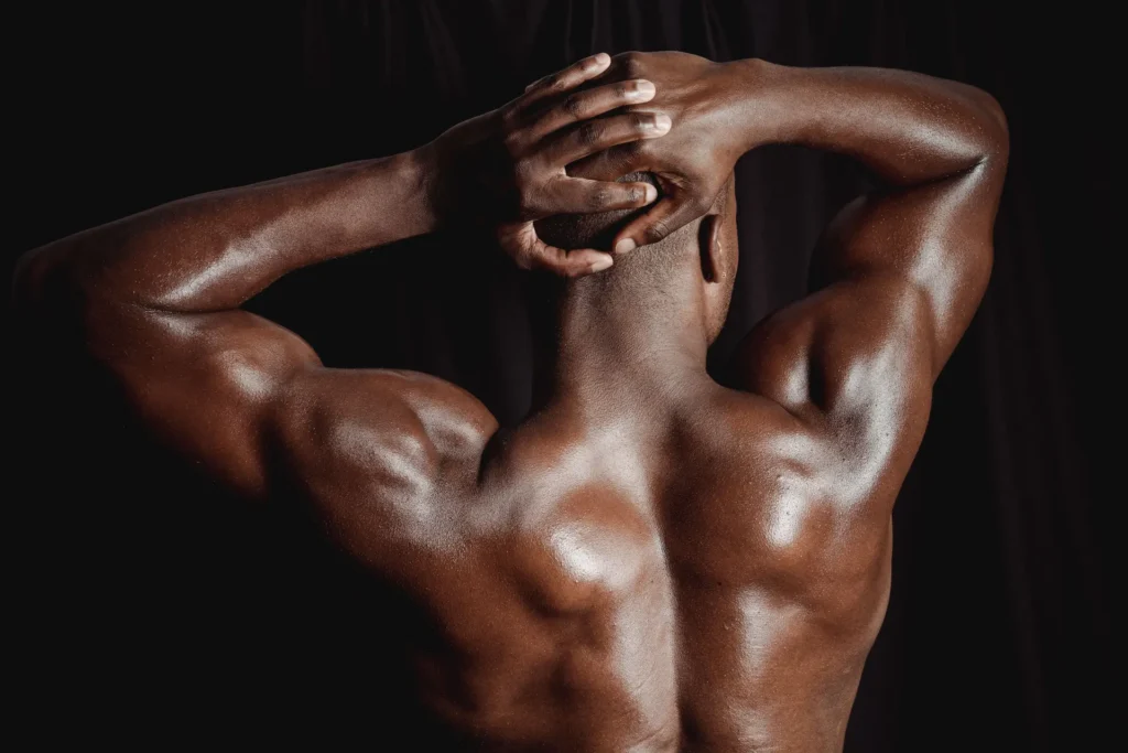 Fit male back with prominent rhomboid muscles built with targeted rhomboid exercises