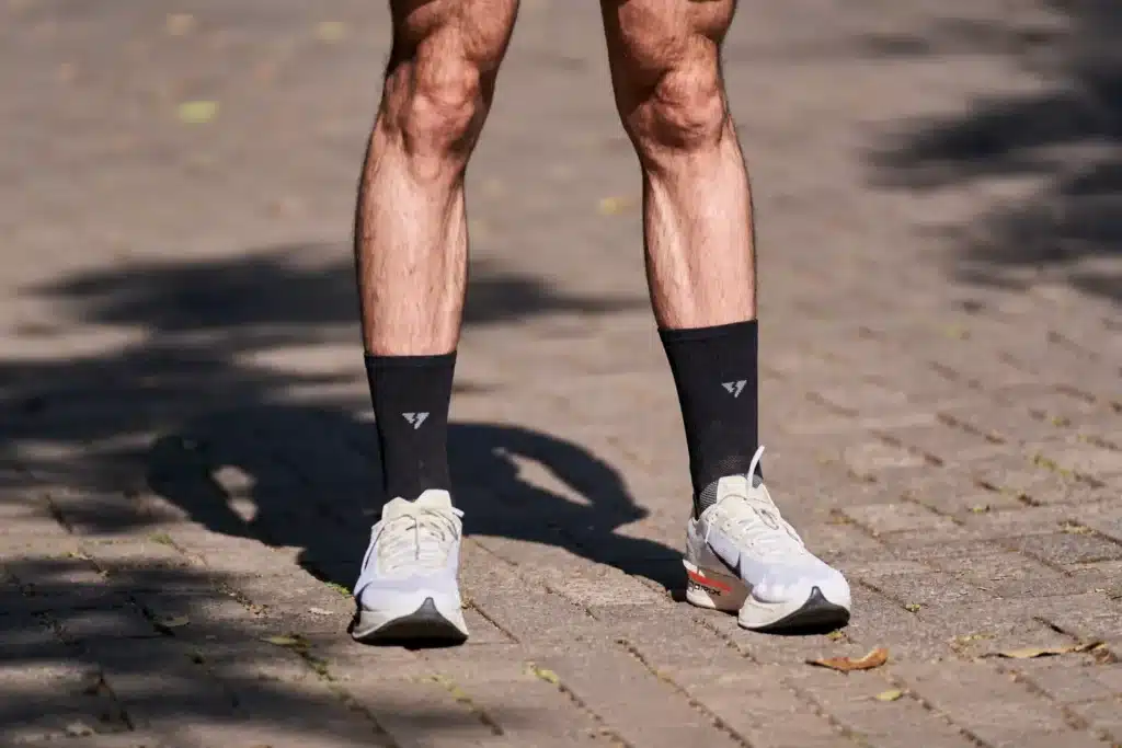 Well-defined tibialis anterior muscles on male legs, developed through targeted tibialis anterior exercises